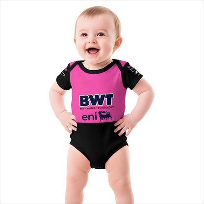 smiling baby wearing BWT Alpine F1 2025 pink black bodysuit front view hands on hips