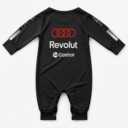 Audi 2026 baby racing onesie back view in black with Audi rings Revolut and Castrol logos