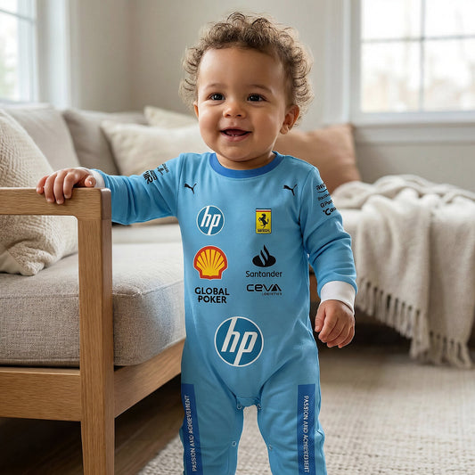 Baby wearing Ferrari blue special edition F1 onesie jumpsuit standing and smiling in living room