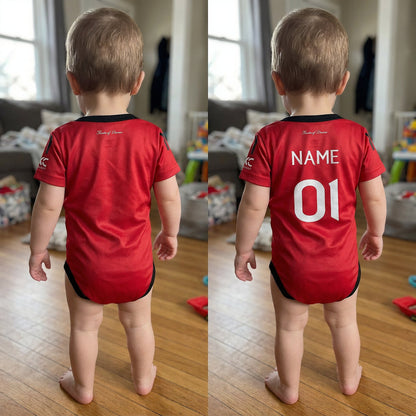 toddler wearing Manchester United 25/26 bodysuit back showing custom name and number option
