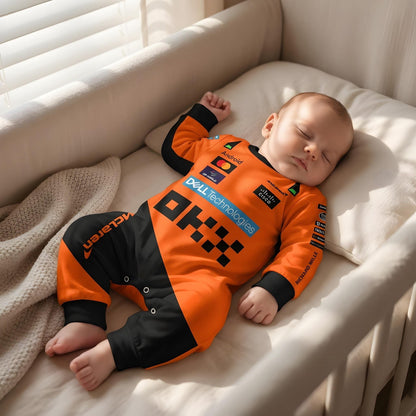 sleeping newborn wearing mclaren racing baby onesie