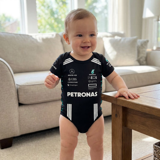 toddler dressed in a 2025 season mercedes f1 racing team's bodysuit