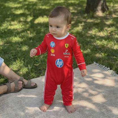 video of a baby outdoors wearing a ferrari baby onesie