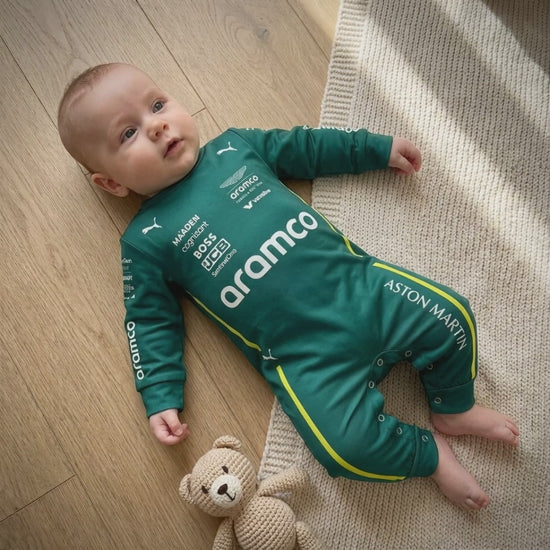 A video showcasing Aston Martin racing Formula One inspired baby oneise jumpsuit