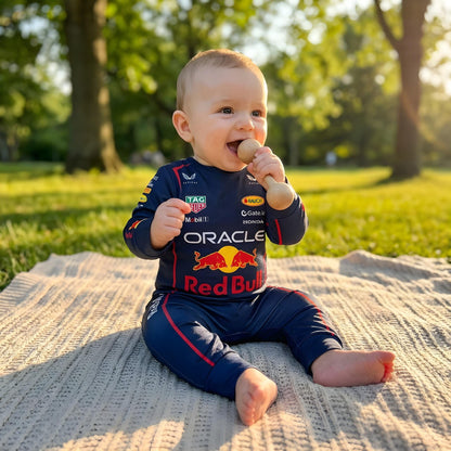 baby wearing Red Bull Racing onesie outdoors